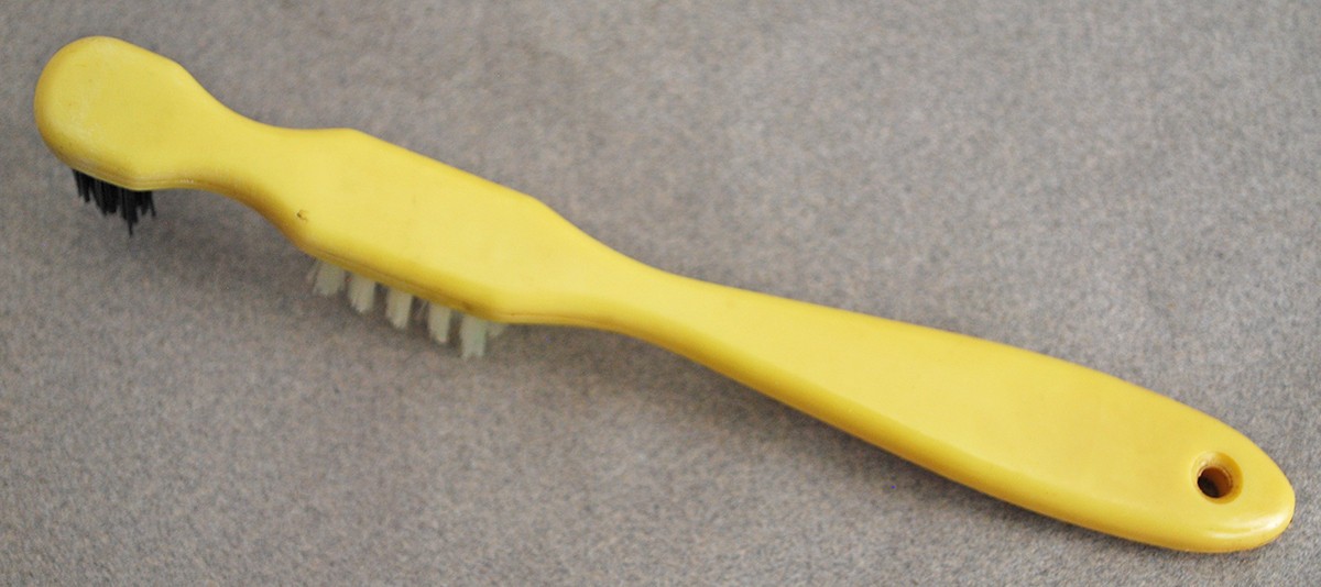Vintage Used Yellow Wernet Plastic Denture Brush 5.75″