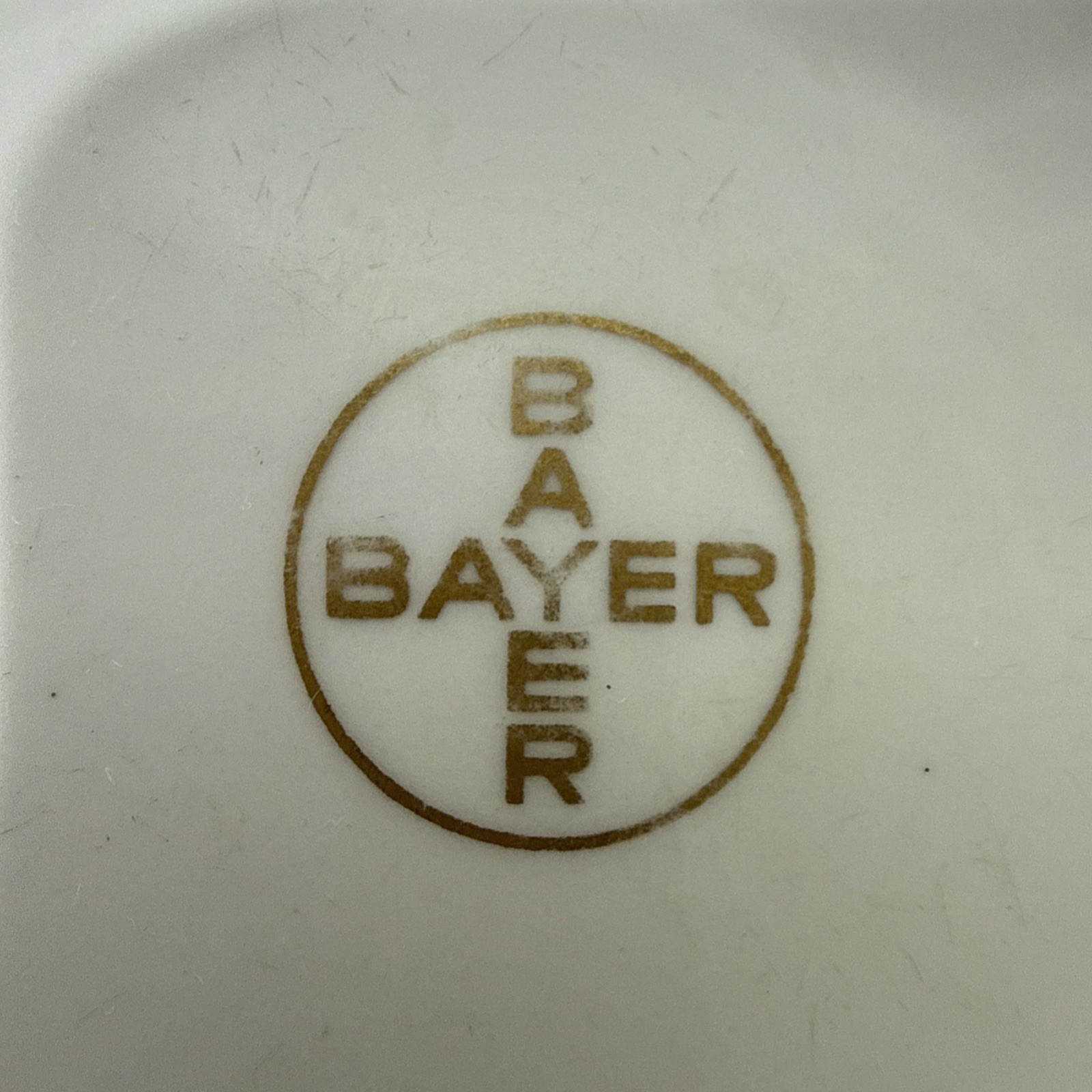 Vtg Bayer Haus Pharmacy Advertisement Promo Porcelain Dish Gold Cross Logo 1952