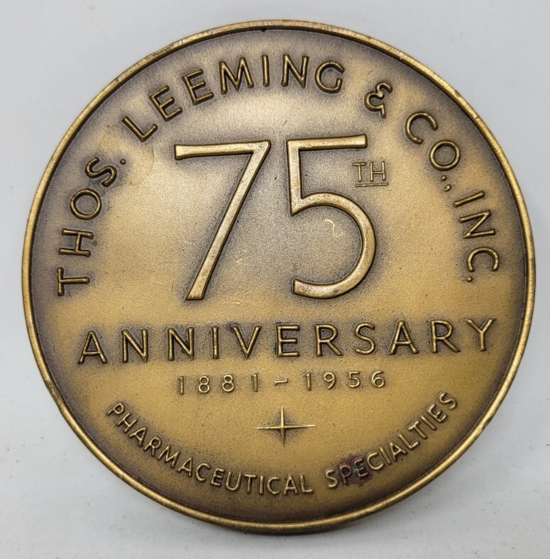 BRONZE THOS LEEMING & CO 1956 PAPERWEIGHT MEDALLION PHARMACEUTICAL AD