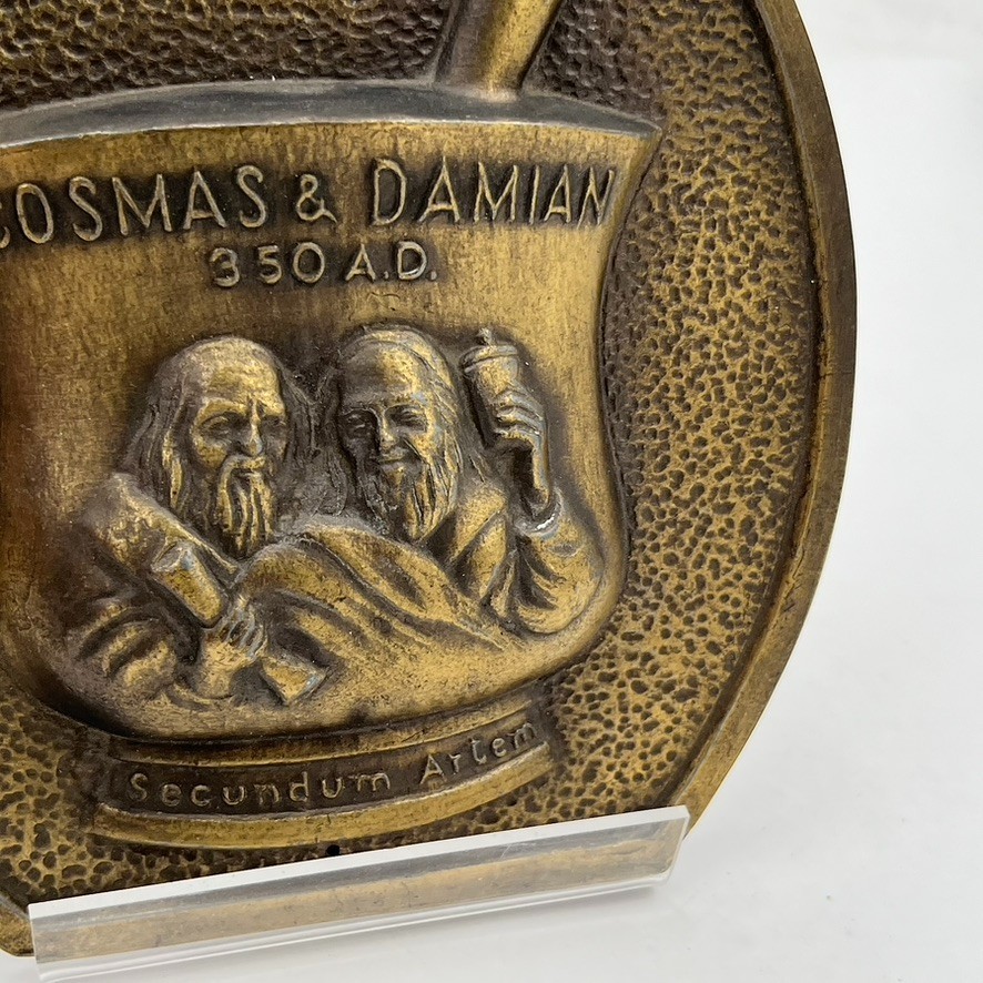 VTG COSMAS AND DAMIAN BRONZE Brass PROMO PLAQUE Advertising Pharmacy Apothecary