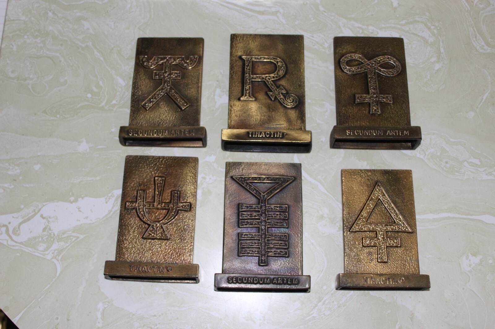 AS FOUND, LOT OF ( 6 ) DIFFERENT SECUNDUM ARTEM TINACTIN BRONZE PAPERWEIGHTS