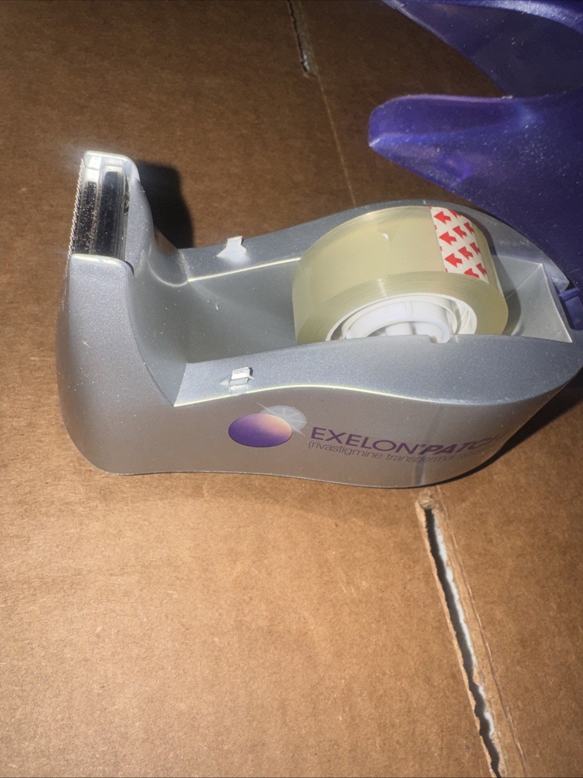 ONE EXELON PATCH DRUG REP PROMO HEAVY WEIGHTED TAPE DISPENSER